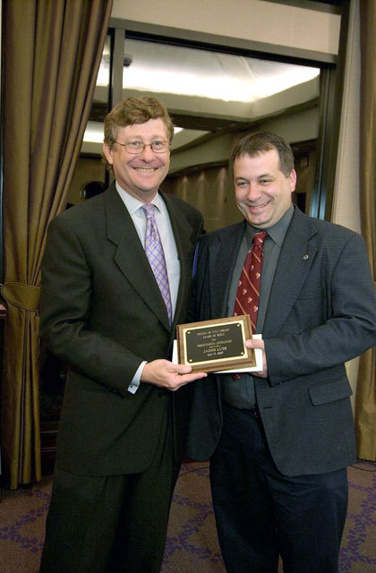 2007 banquet: James Lutz accepting Professional Excellence award from Kevin Kuenzli.
