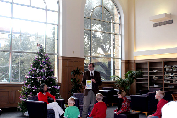 A Christmas author reading in the Gearhart Reading Room.
